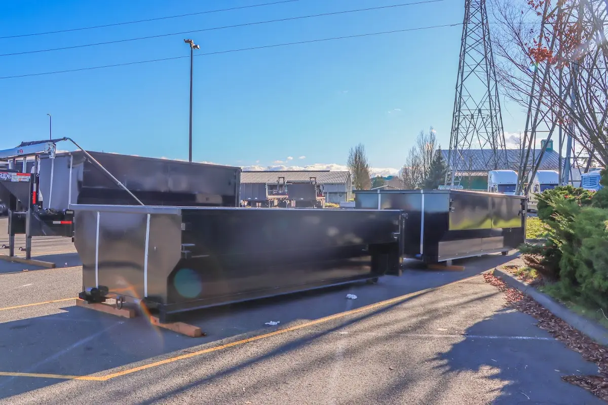 Roll-off dumpster ready for waste disposal at job site for 15 Yard Dumpster Rental in Elmhurst
